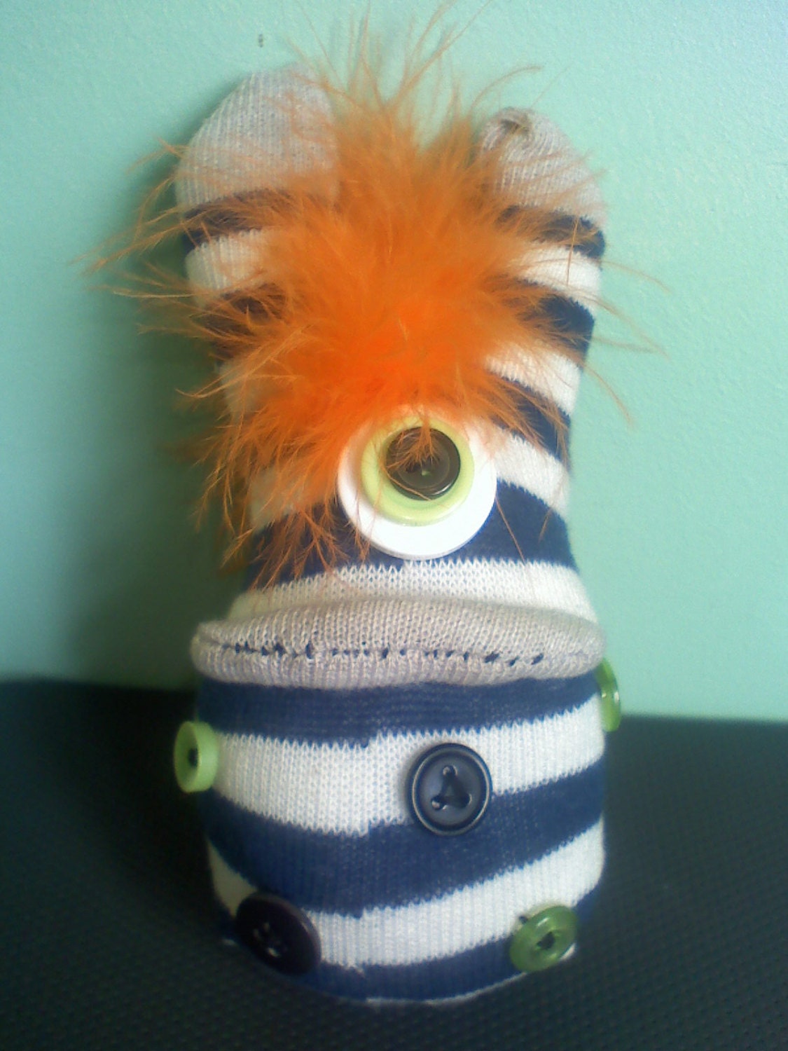 sock monster with button spots.