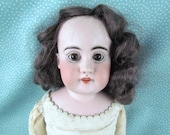 Antique Doll from Germany Porcelain Leather Body Glass Eyes Beautiful from 1800's