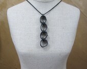 Quattro Noir Drop Inner Tube Necklace