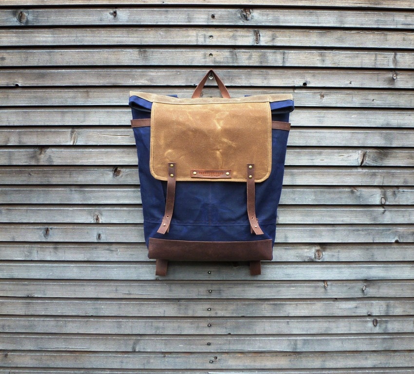 Waxed canvas backpack / rucksack with folded top and waxed leather shoulderstrap and bottom