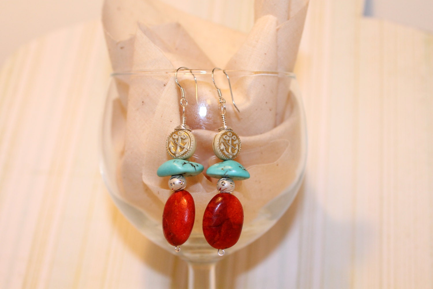 925 Sterling Silver Earrings w/ Turquoise Howlite, Coral, and a Ship Anchor Bead. Wire wrapped.