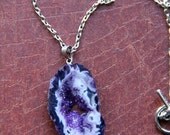 purple hued agate geode slice pendant necklace