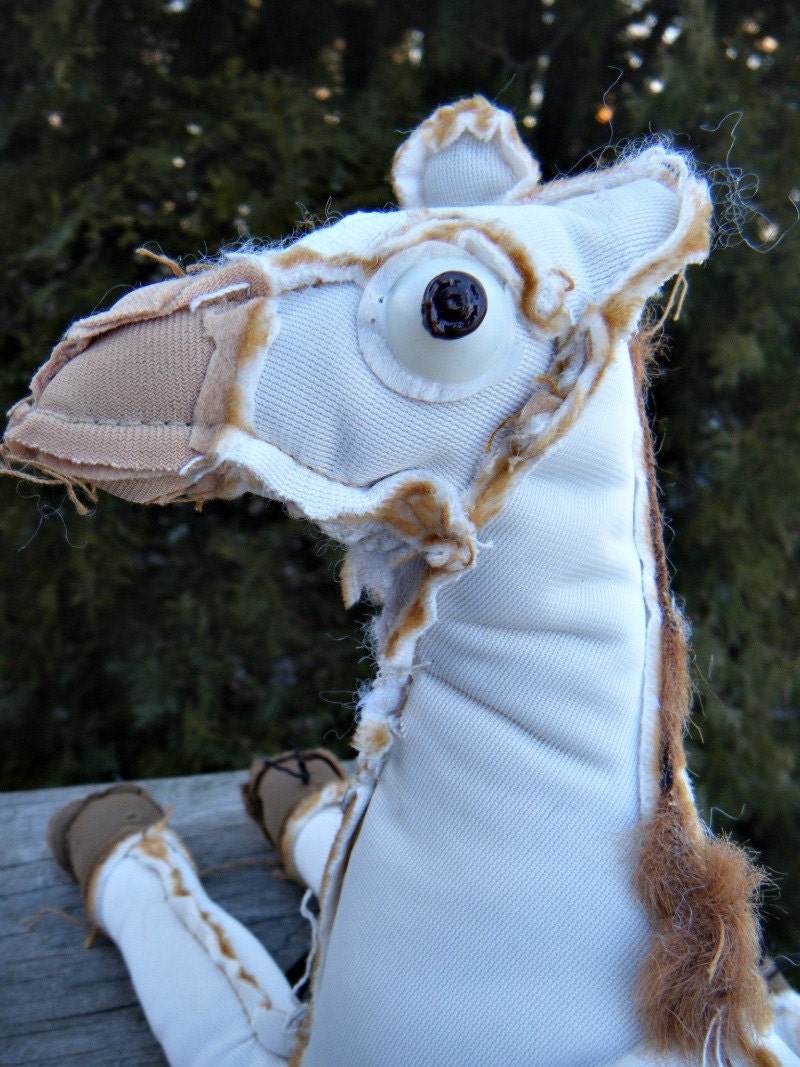 Giraffe OUTSIDER Zombie. Inside out stuffed Malbec Giraffe. Watch out sharp eyes.