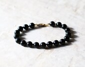 vintage black glass bead and sterling silver bracelet