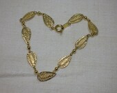 Vintage Bracelet: Trifari, Delicate goldtone Filigree, 1970s/80s
