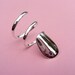 Robopop swirl finger nail ring