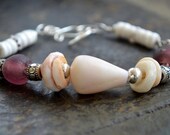 Puka shell bracelet with african purple pink glass beads, Hawaiian shell jewelry