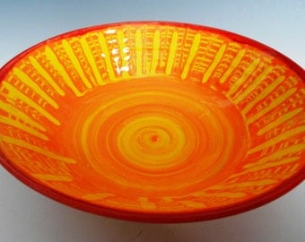 Ceramic sunset bowl with colored slips and glazes
