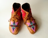 Women's handmade leather beaded wool-lined moccasin winter boots with wool felt insole and crepe rubber sole