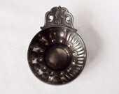 A pewter tastevin from Paris, France