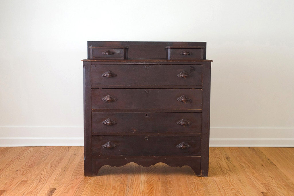 Antique Dark Wood Chest of Drawers with Carved Clam Shell Handles