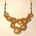 Brass Wire Crochet Spirals Bib Necklace with Antiqued Brass tear drop and Gold Plated Chain