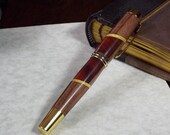 Handmade Commissioner fountain pen in rosewood, paduak, red oak and yelowheart with gold hardware