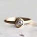 Rustic engagement.. A warm glassy grey rose cut diamond ring. Rain.