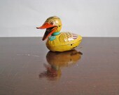 vintage tin spring duck toy
