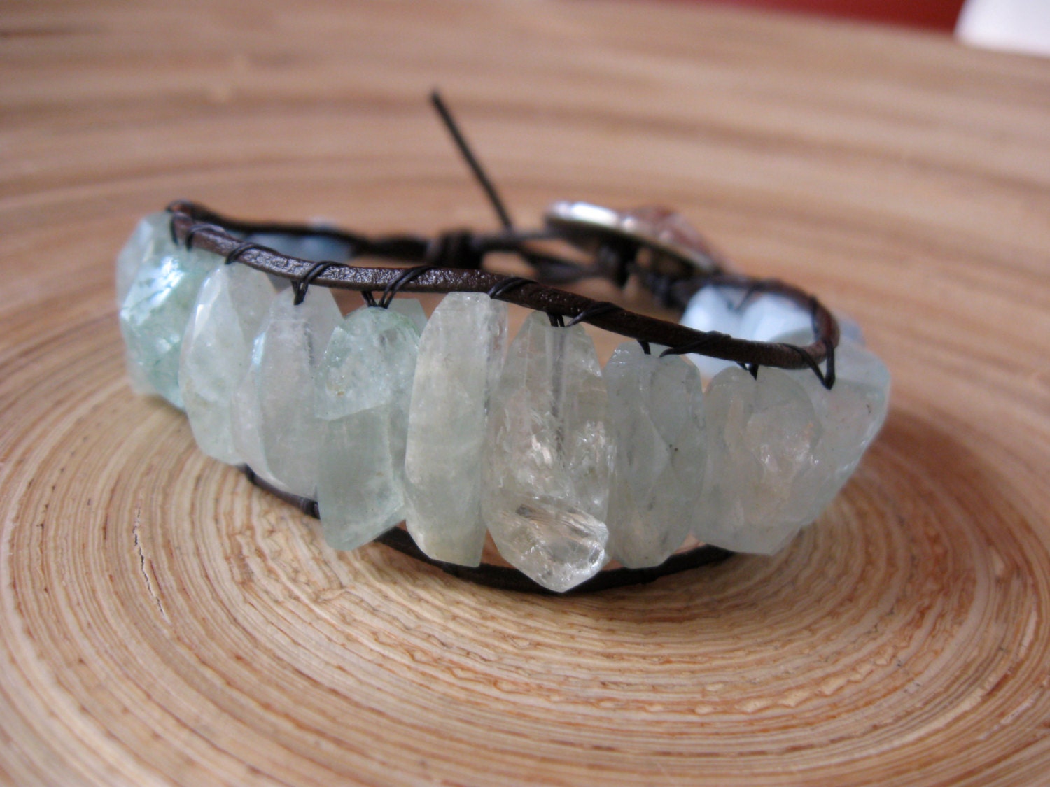 Aquamarine leather wrap bracelet with large faceted gemstone and silver button