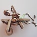 Nuvo Silver Man in a Deckchair Charm Moves