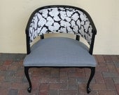 Round back curved arm chair with grey black white flower fabric