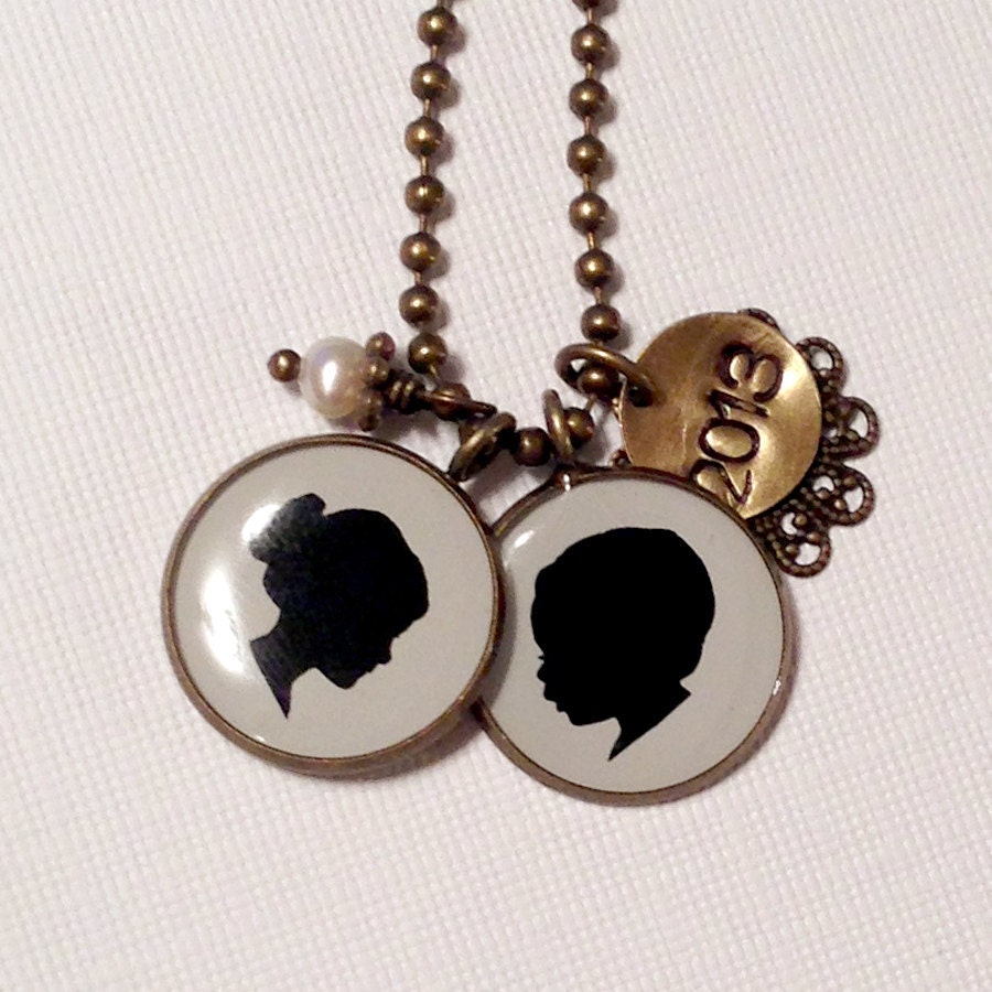 Two Large Custom Child Silhouette pendants in brass with stamped tag & pearl