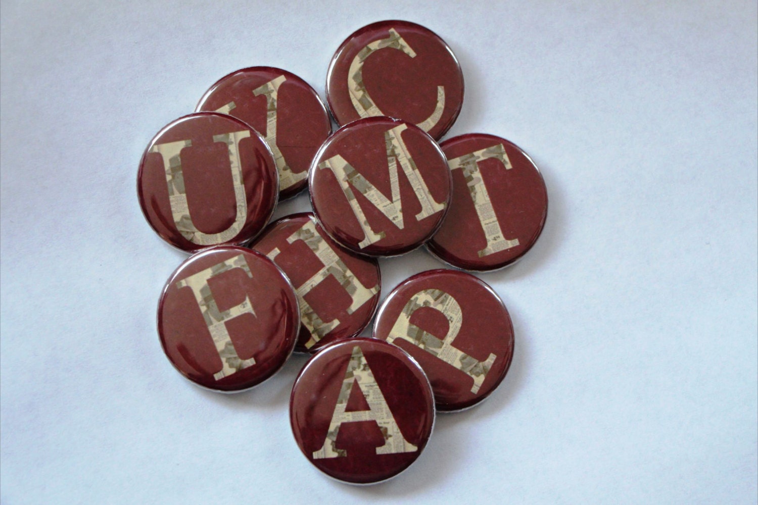 26 News Paper print Alphabet 1.25" Buttons.