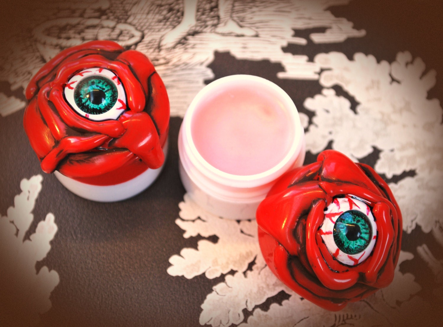 Gorey Strawberry eyeball lip balm