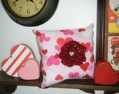 Throw pillow, pink hearts with flower