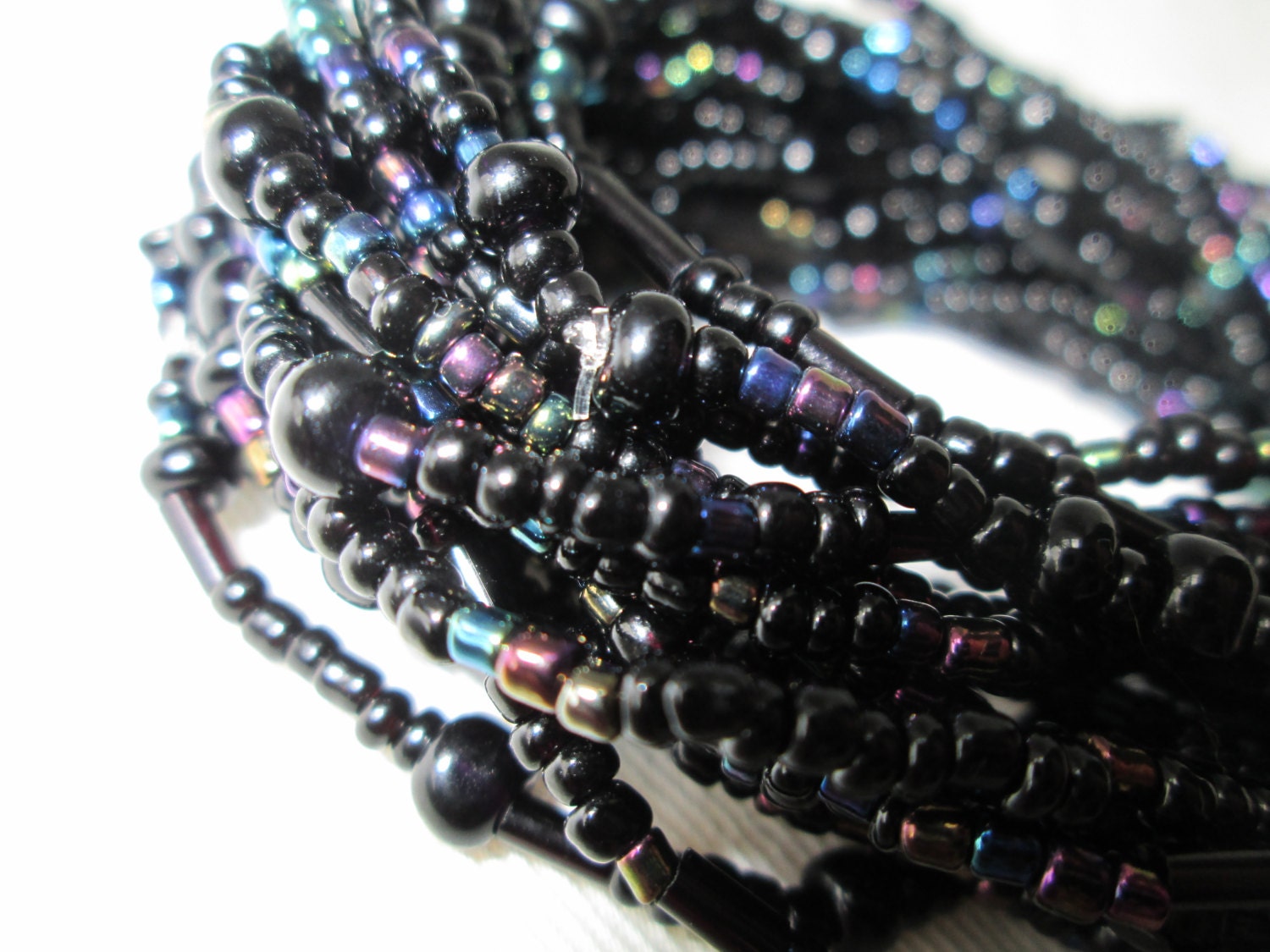 Qty 10 Black pearl & rainbow finish stretch bracelet