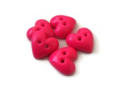 Neon pink heart buttons