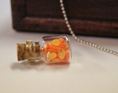 Tiny baby chicks in a tiny glass bottle necklace
