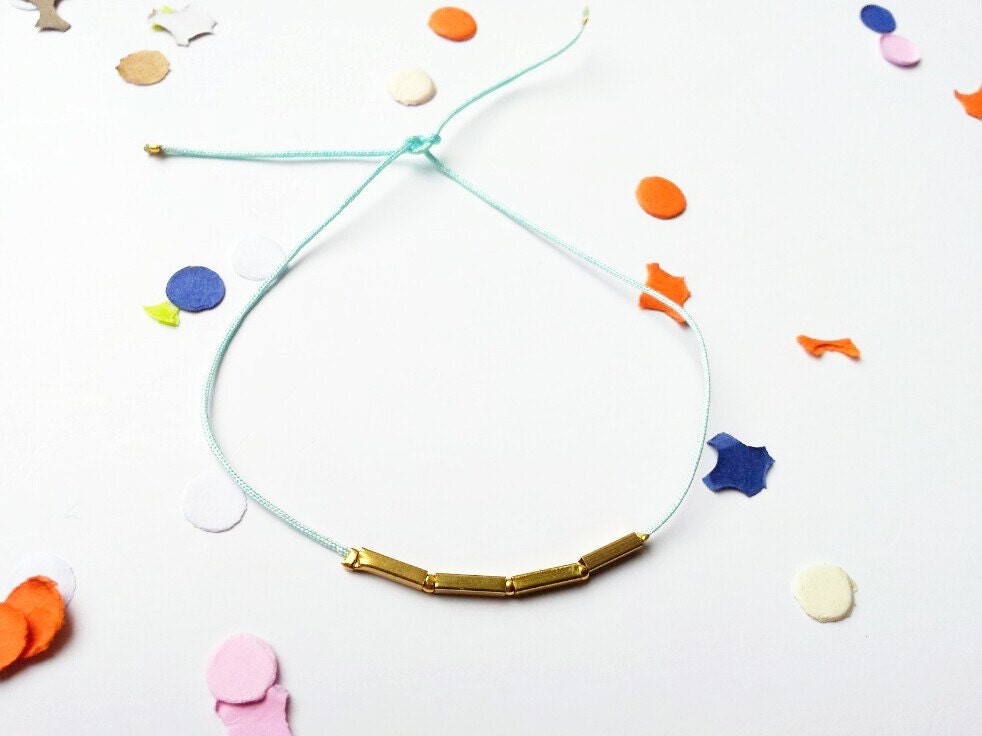 Sunlight bracelet/ nylon cord and raw brass tube
