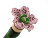Wine Stopper- Porcelain purple pink and green flower.  A unique host or hostess gift.