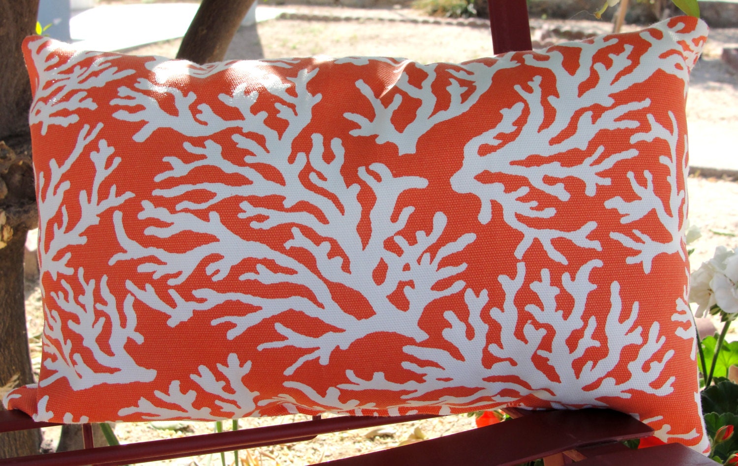Coral and white accent throw pillow - coral print fabric - indoor / outdoor