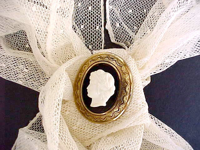Pretty Vintage Metal and Celluloid Cameo Brooch Signed "Coro"
