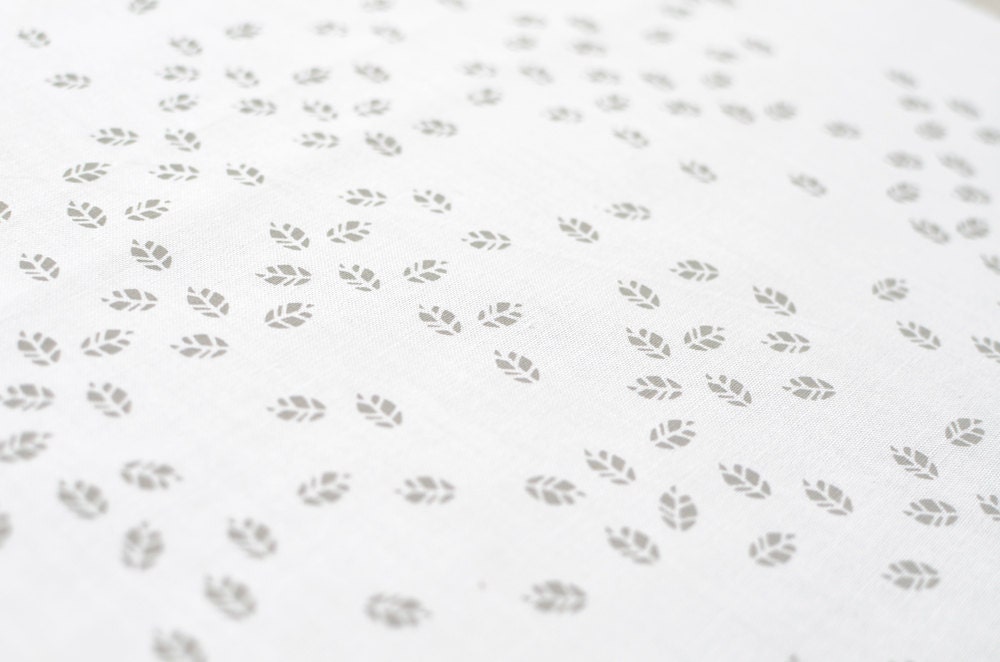 litterfall in pale grey on white quilting weight cotton handprinted fabric panel