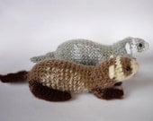 Realistic crocheted ferret plushie
