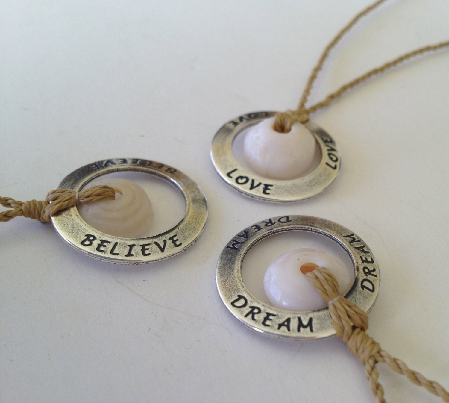 Polynesian roping with Puka shell & "dream" pendant