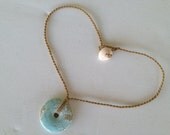 Polynesian roping with Turquoise doughnut pendant 