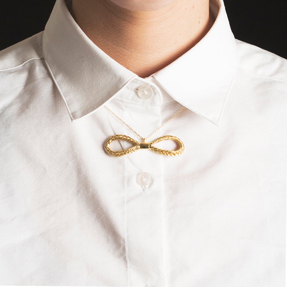 Magnitude Plait - Fishbone - bow pendant (golden blond)