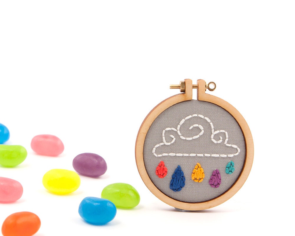 Rain cloud embroidered brooch - red, navy, orange, purple and green raindrops - made with love by dandelyne
