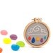 Rain cloud embroidered brooch - red, navy, orange, purple and green raindrops - made with love by dandelyne
