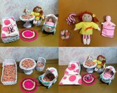 Two dolls with wicker furniture - bed with bedding - buggy - table - chair - the carpet - bouquet of flowers in a vase and kitten