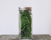 Emerald green creek glass.