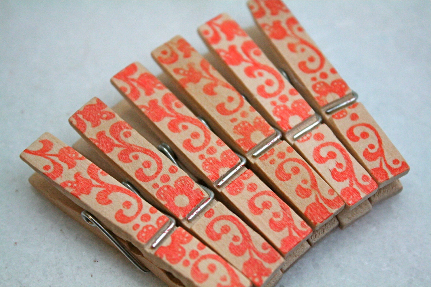 Printed mini clothespins, 50, floral design in orange.  Perfect wedding display for photos, seating cards, guest book alternative.