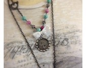 Dragonfly wax seal pendant on eases necklace 
