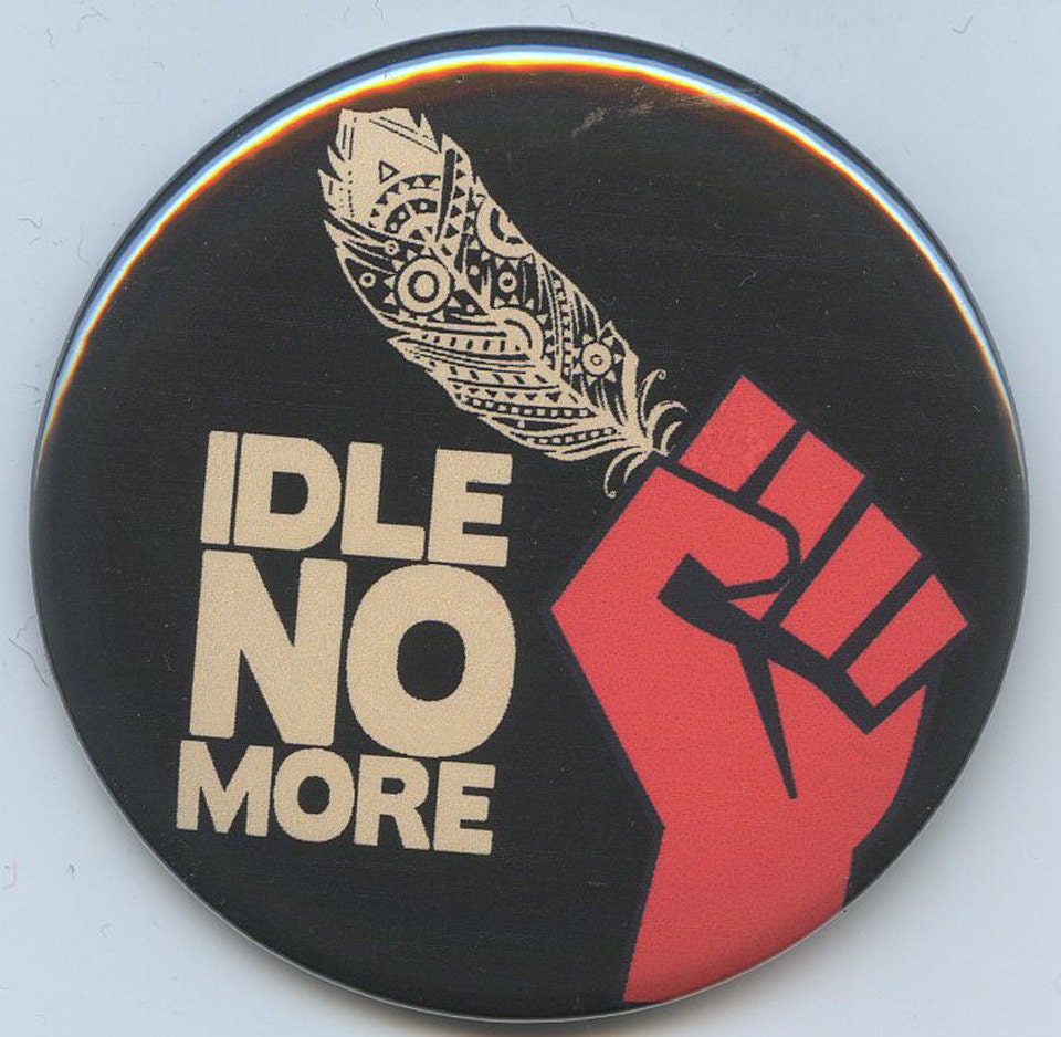 Idle No More Fist an Feather button
