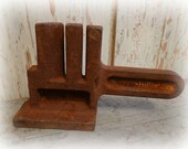 antique cast iron chain detacher tool
