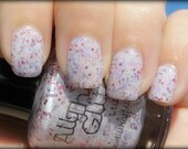 I Luv Me - white creme base with red, pink and purple glitter nail polish