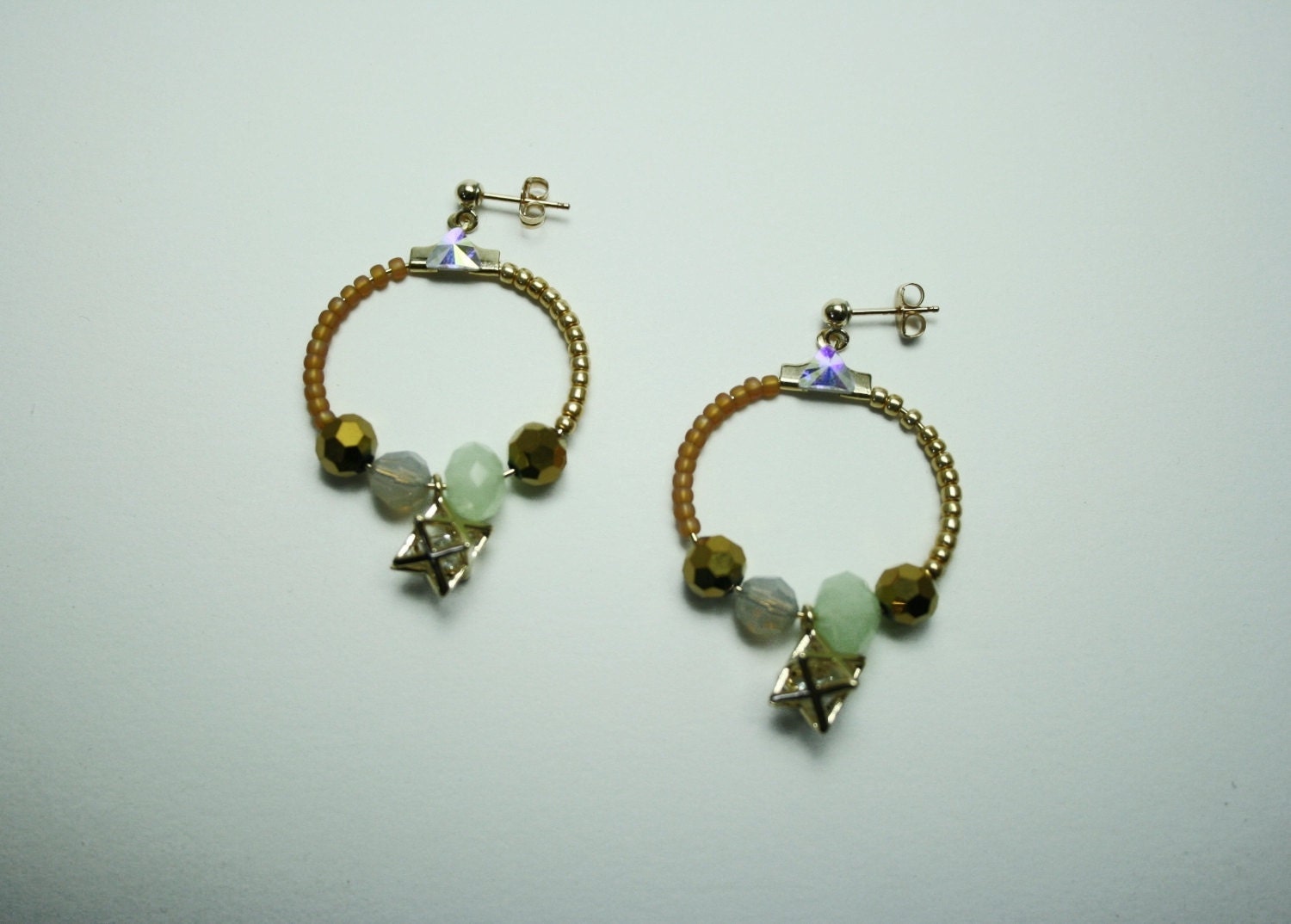 Light traveler gold star earrings 1
