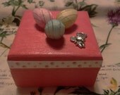 Egg box with tennis playing rabbit
