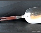 Vintage 1970's Stanhome Stanley Roberts stainless steel kitchen tool serving spoon serving scoop with brown Bakelite handle